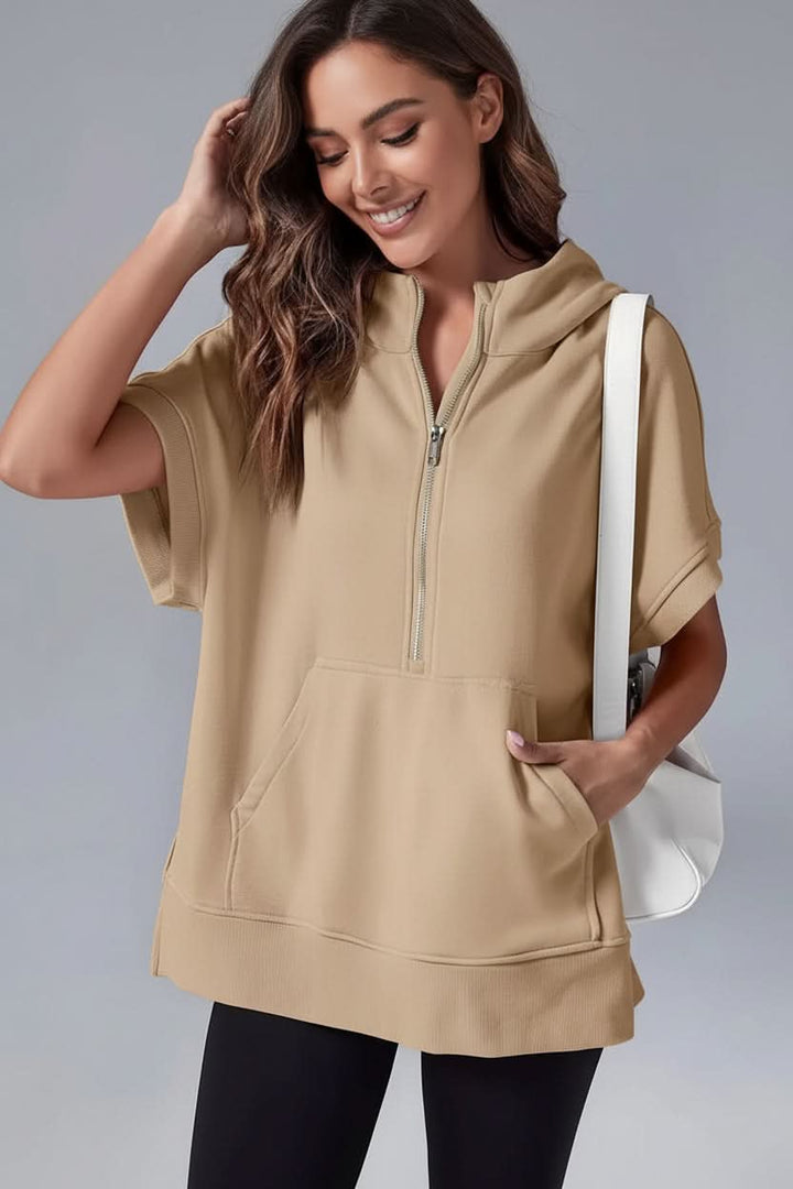 Soft women's cozy short sleeve half-zip hoodie, relaxed fit, offering ultimate comfort for everyday wear.