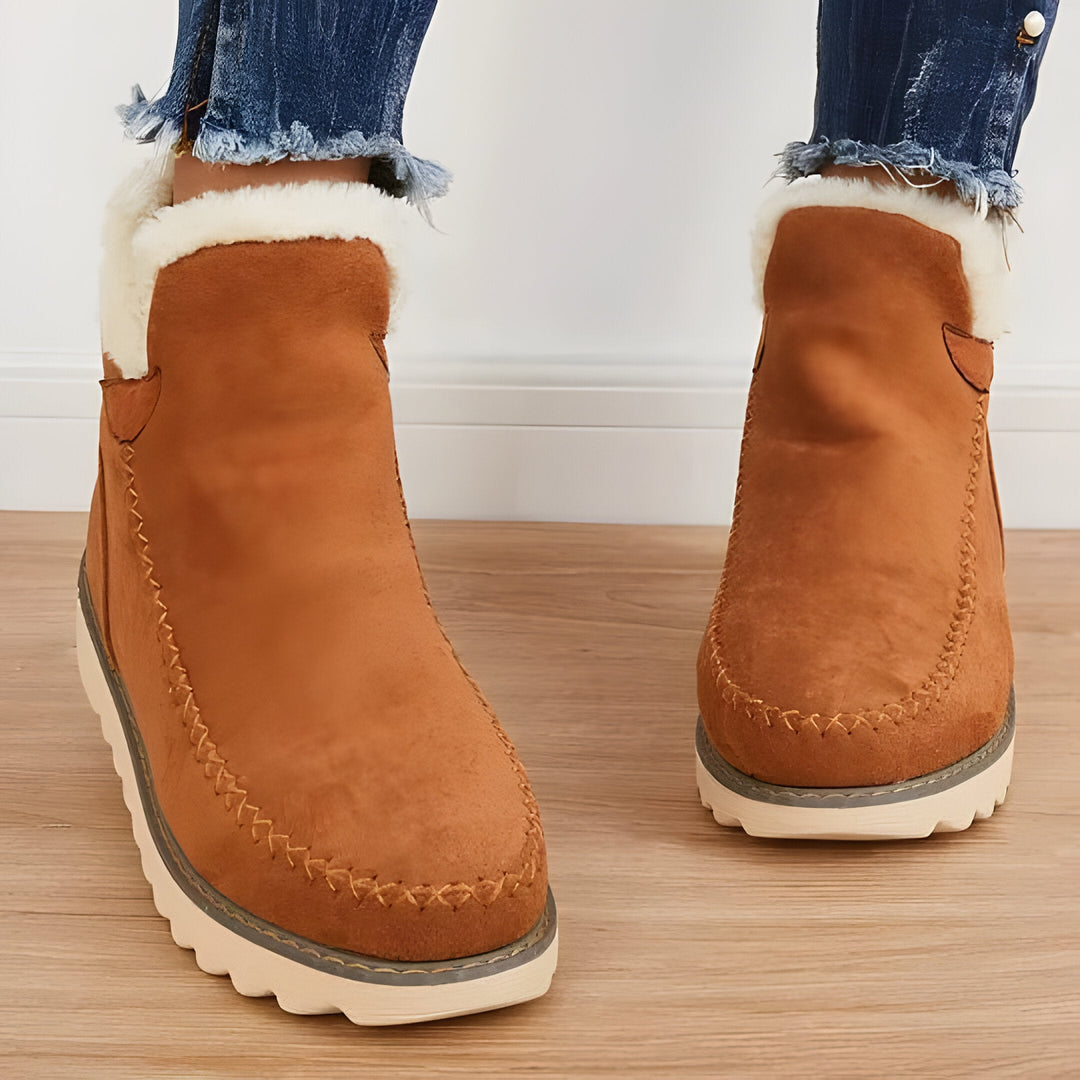 Comfortable women's winter slip-on ankle boots with arch support; warm, cozy, & shock absorbing.