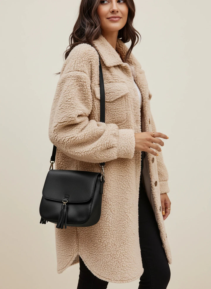 Chic women's teddy shacket, button-down, soft faux fur, perfect for casual fall fashion.