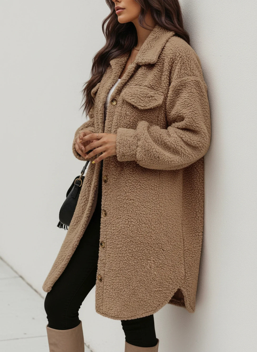 Button-down women's teddy shacket in a cozy oversized fit, chic outerwear for fall/winter.