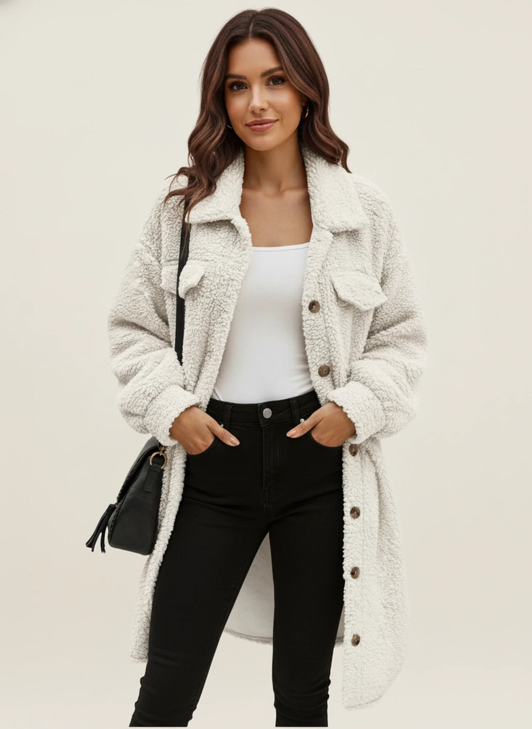 Warm women's winter teddy jacket, oversized fit, versatile casual layering piece.