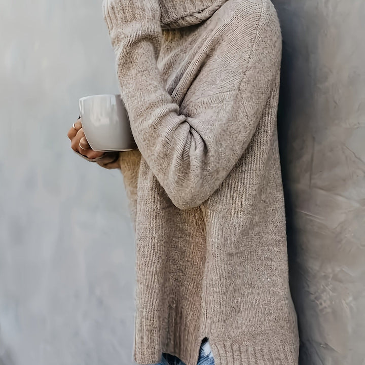 Women's everyday long sleeve turtleneck sweater with a fashionable split hem detail.