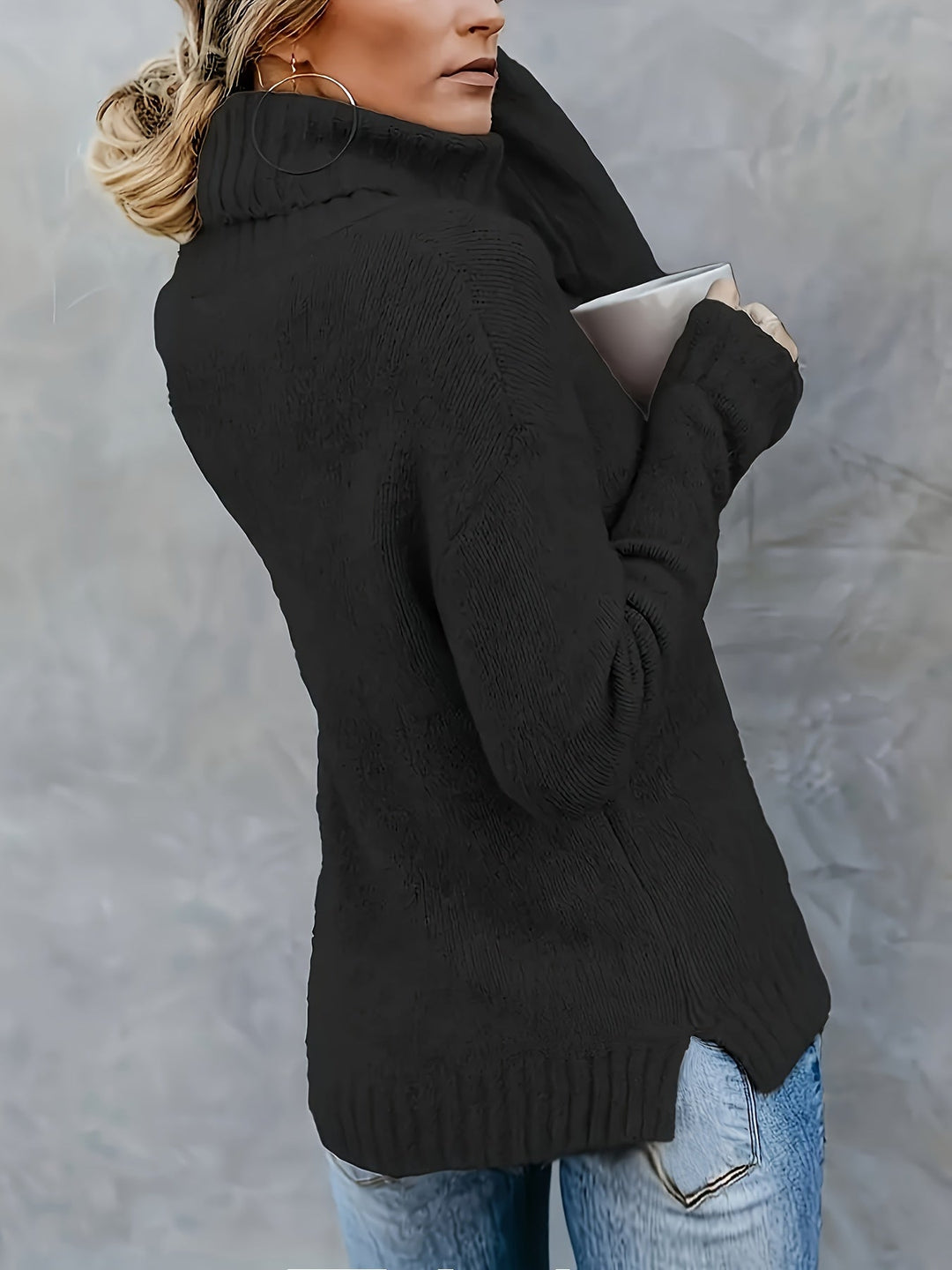 Stylish women's turtleneck sweater, split hem detail, ideal for casual fall and winter outfits.