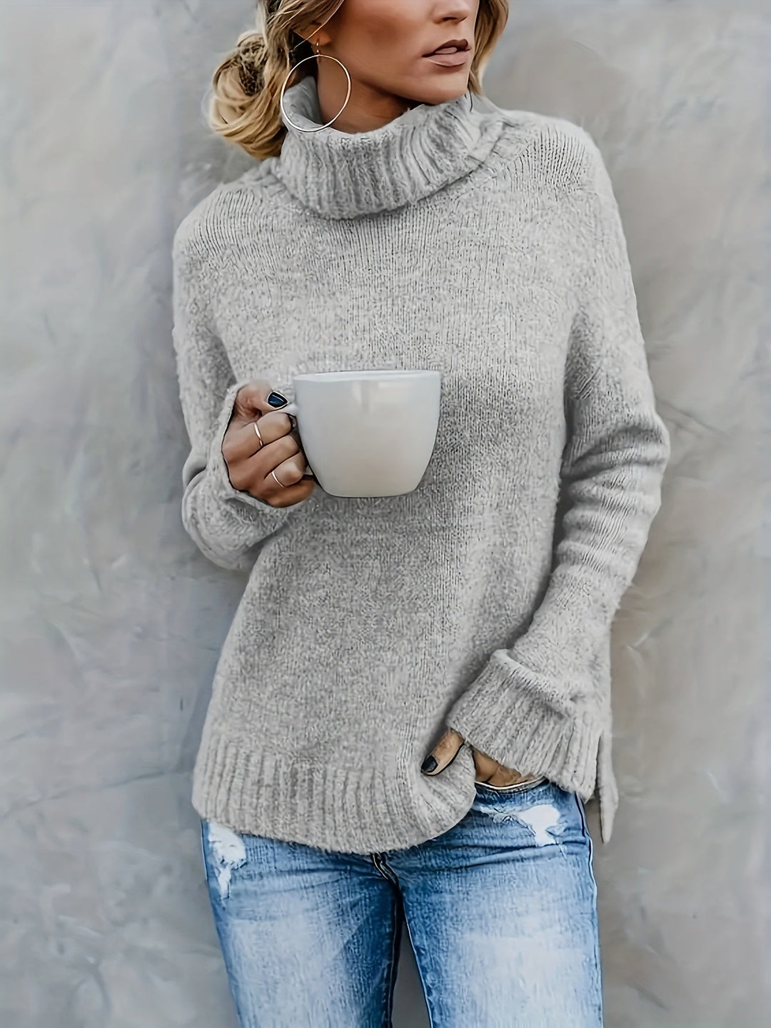 Relaxed fit women's turtleneck sweater, split hem, essential for fall & winter fashion.