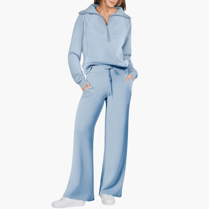 Relaxed fit women's wide-leg lounge set featuring a comfortable zip-up hoodie, perfect for casual wear.
