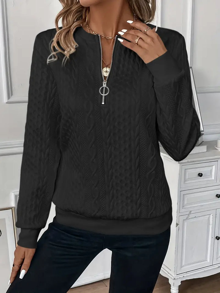Versatile women's zippered sweater, comfortable knit for stylish layering.