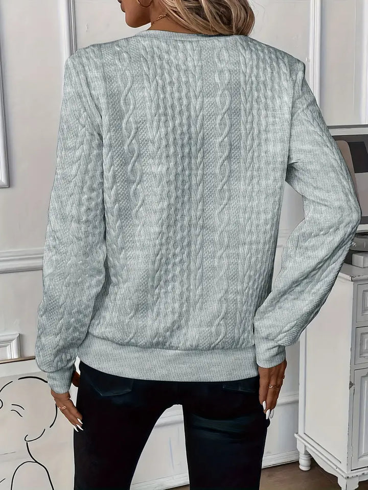 Relaxed fit women's zippered knit sweater, comfortable & fashionable.