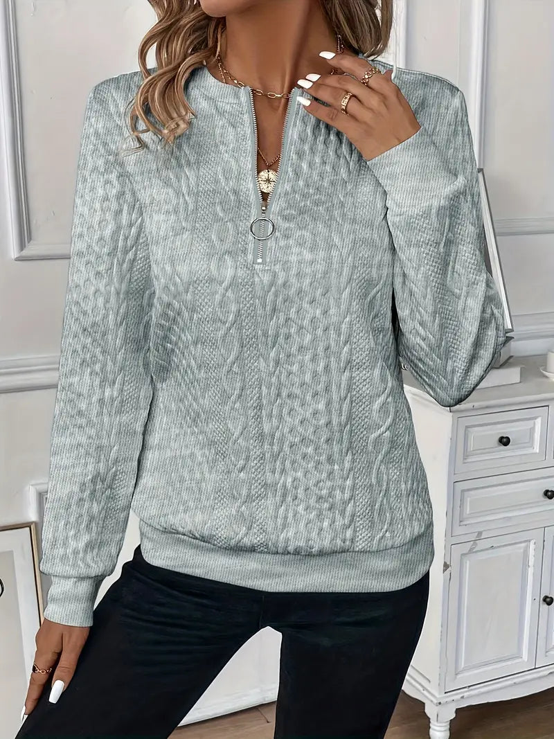 Women's versatile zippered sweater for layering, comfortable and trendy.