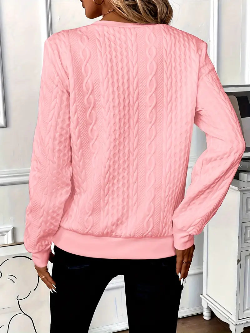 Comfortable female zippered sweater, soft knit ideal for cozy layering.