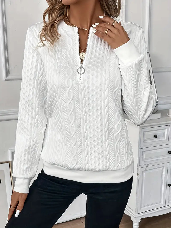 Fashionable women's zip-up sweater, perfect for chilly days & chic layering.