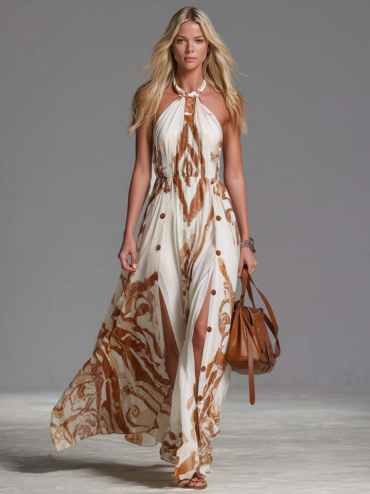 Flowy abstract print halter neck maxi dress for women, with a side split for comfortable movement. Ideal for summer.