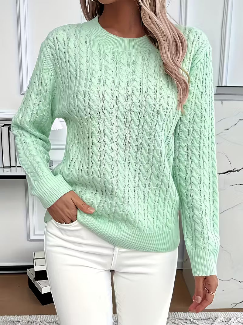 Soft women's cable knit crew neck jumper in a rich texture. Perfect for autumn layering & casual wear.