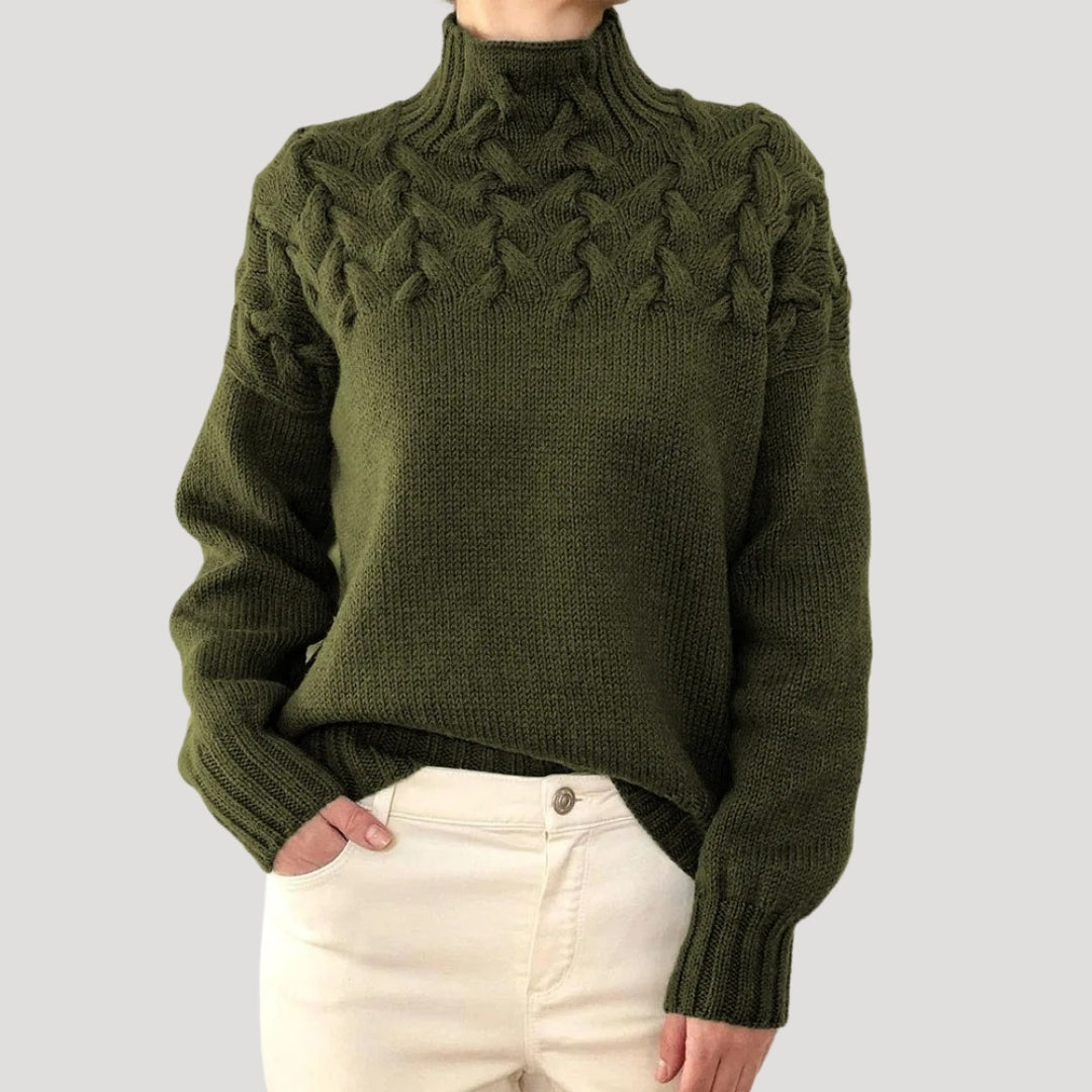 Women's cable knit high-neck sweater, a blend of winter sweater warmth and spring style