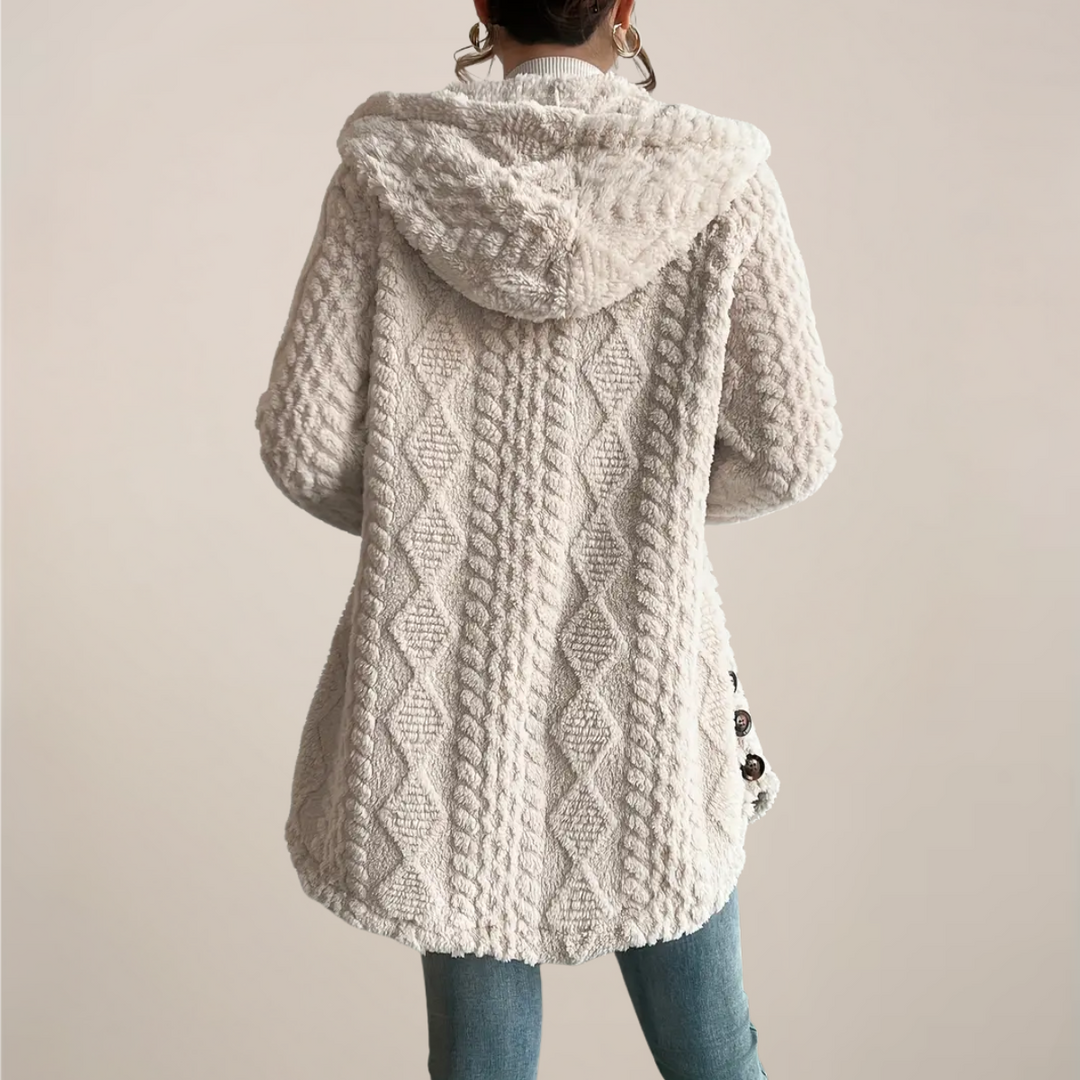 Stylish women's hooded cardigan in textured knit, a versatile layering piece for spring outfits