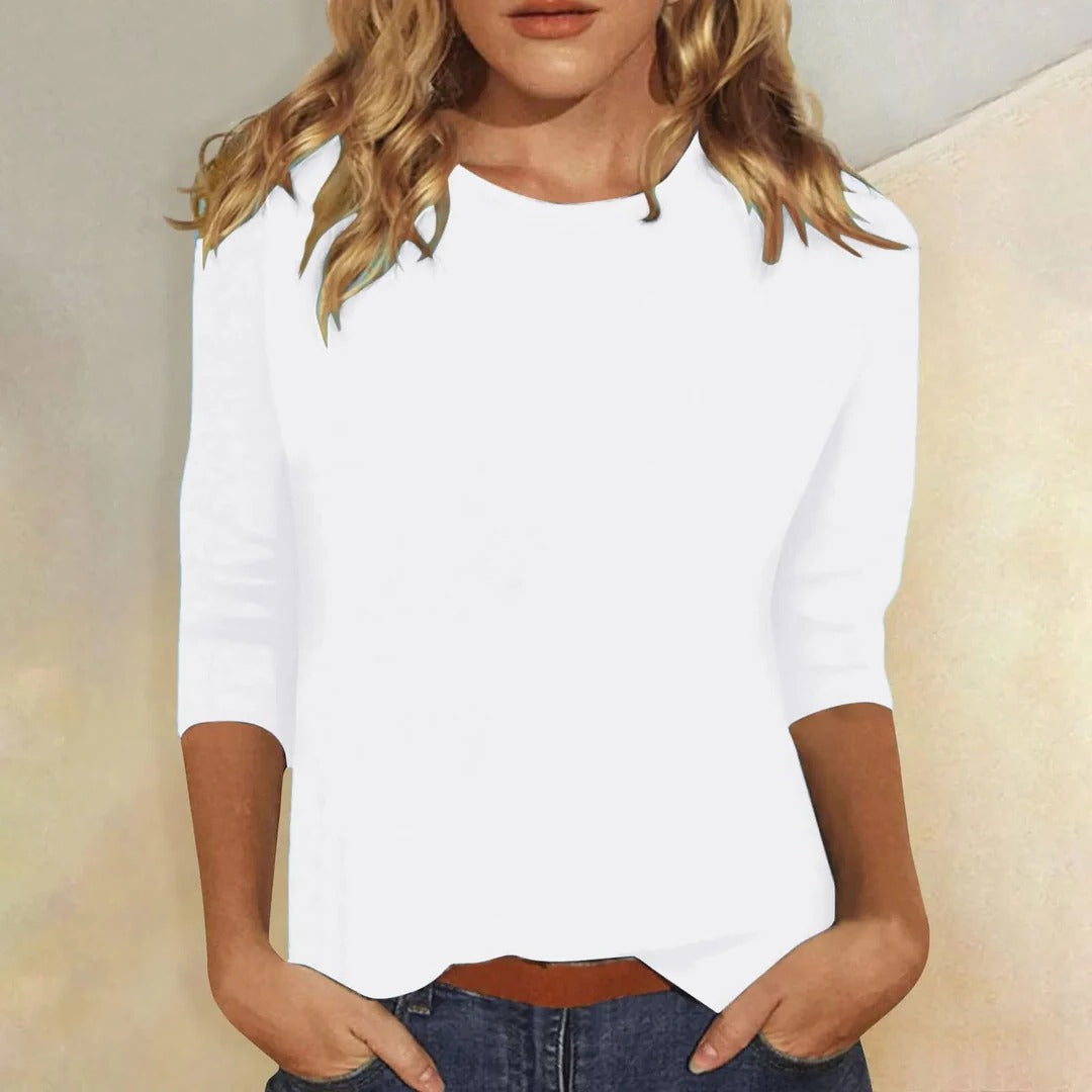 Comfortable women's casual top with crew neck & 3/4 sleeves, perfect for everyday relaxed fit.