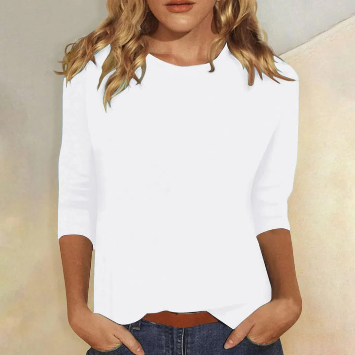 Comfortable women's casual top with crew neck & 3/4 sleeves, perfect for everyday relaxed fit.