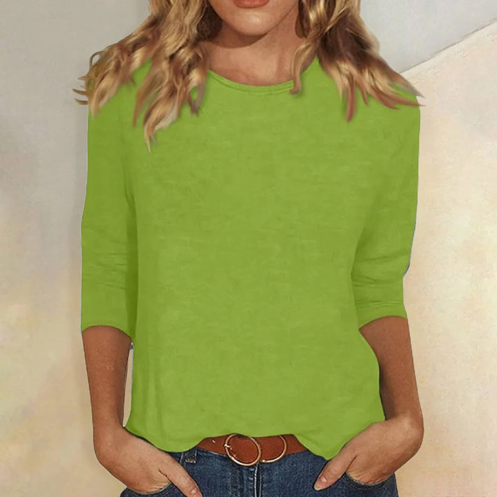 Chic & versatile women's 3/4 sleeve crew neck top. Relaxed fit for stylish everyday fashion.