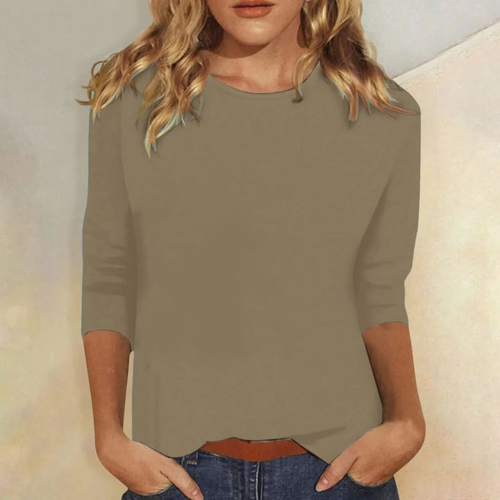 Women's comfortable crew neck 3/4 sleeve top. Relaxed fit for versatile, everyday casual wear.