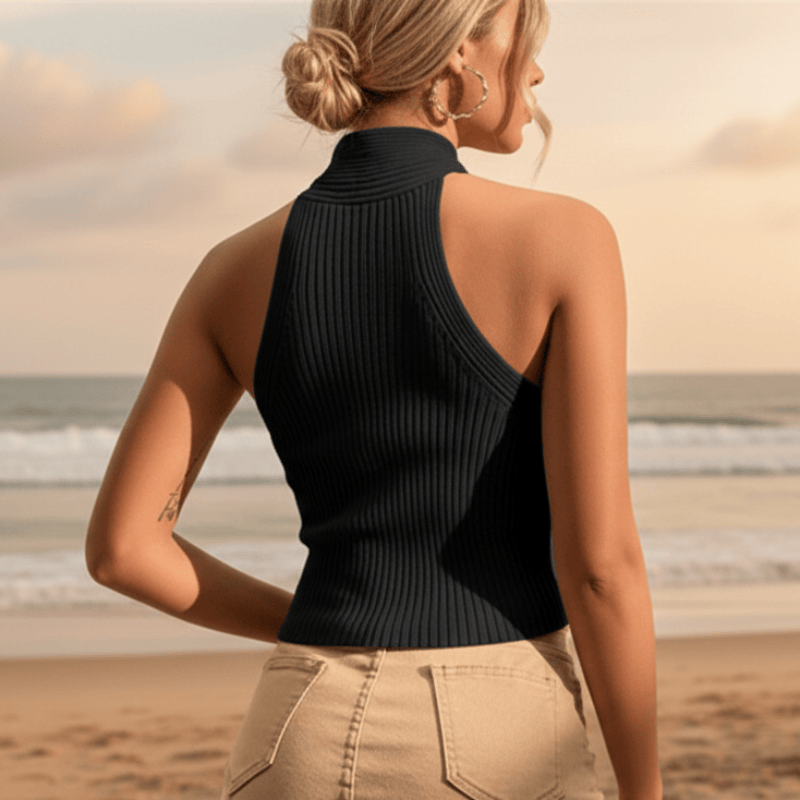 Women's comfortable ribbed halter crop top with criss-cross detail, great for sunny casual summer days.