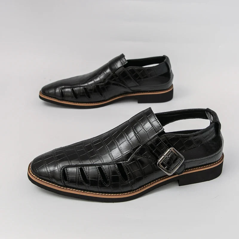 High-angle view of fashionable women's croc embossed leather buckle sandals