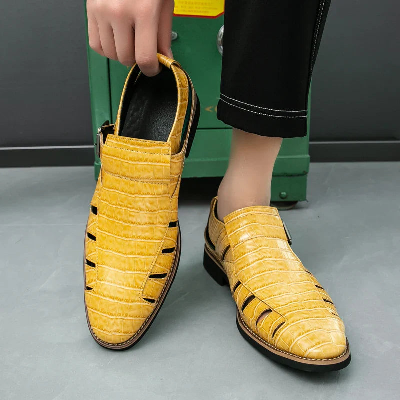 Detail shot of the polished buckle on women's croc embossed summer sandals