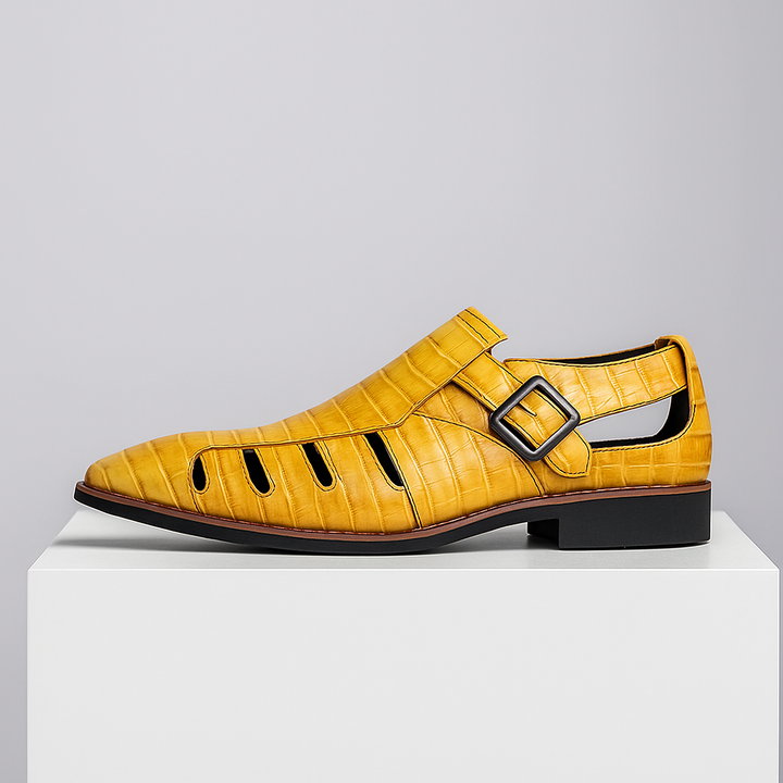 Pair of women's leather sandals, featuring a croc embossed pattern and adjustable buckles