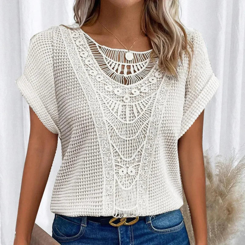 Women's casual chic crochet-style short sleeve blouse, featuring a lovely round neck design.