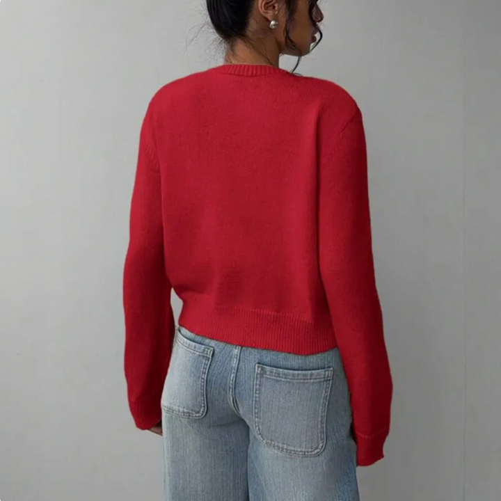 Full-body shot of woman styling cropped button cardigan with casual outfit