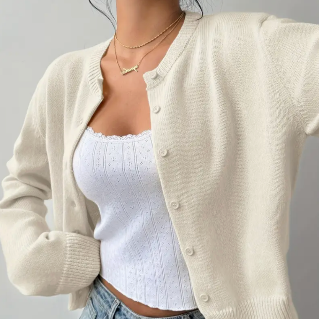 Close-up of lightweight, cropped button-front cardigan for women, casual style