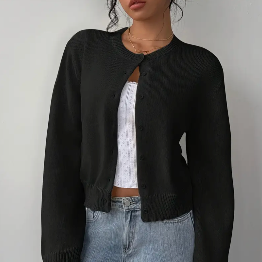 Back view of women's cropped cardigan, showcasing its flattering fit