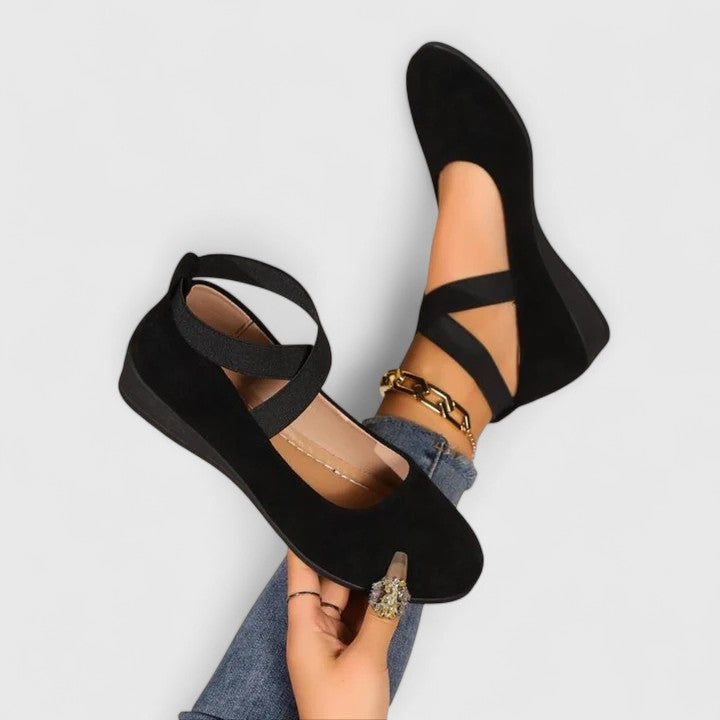 Elegant women's ballet-style closed-toe wedge sandals with elastic strap, ideal for dressy or everyday summer wear.