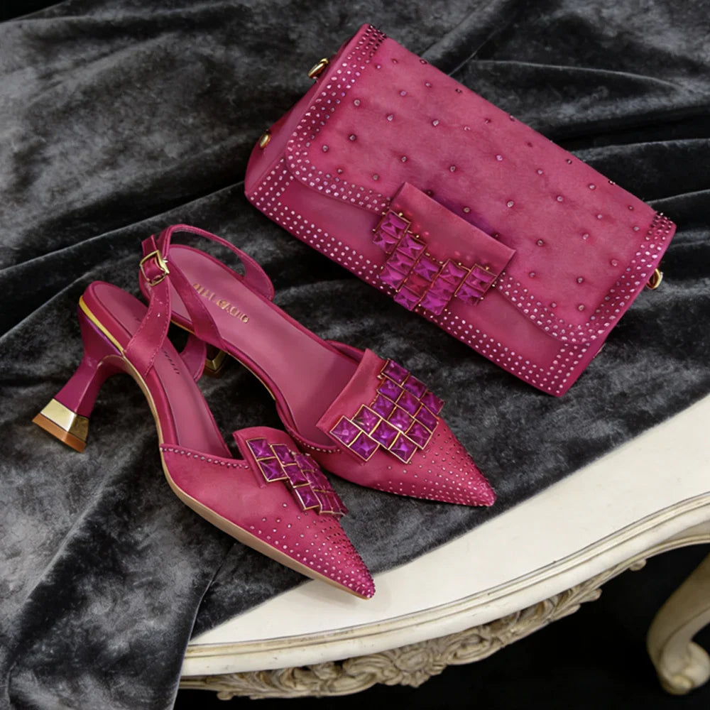 Luxurious women's crystal embellished pointed toe heels and clutch bag. A sophisticated matching evening set.