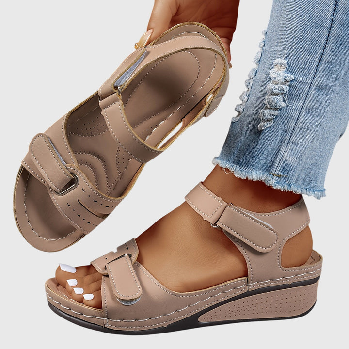 Stylish women's comfort sandals with crystal design, orthopedic features, and arch support.