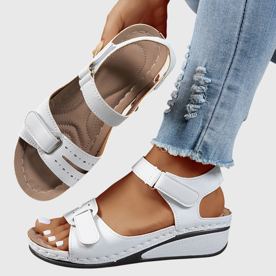 Everyday walking comfort in women's crystal orthopedic slip-on sandals with excellent arch support.