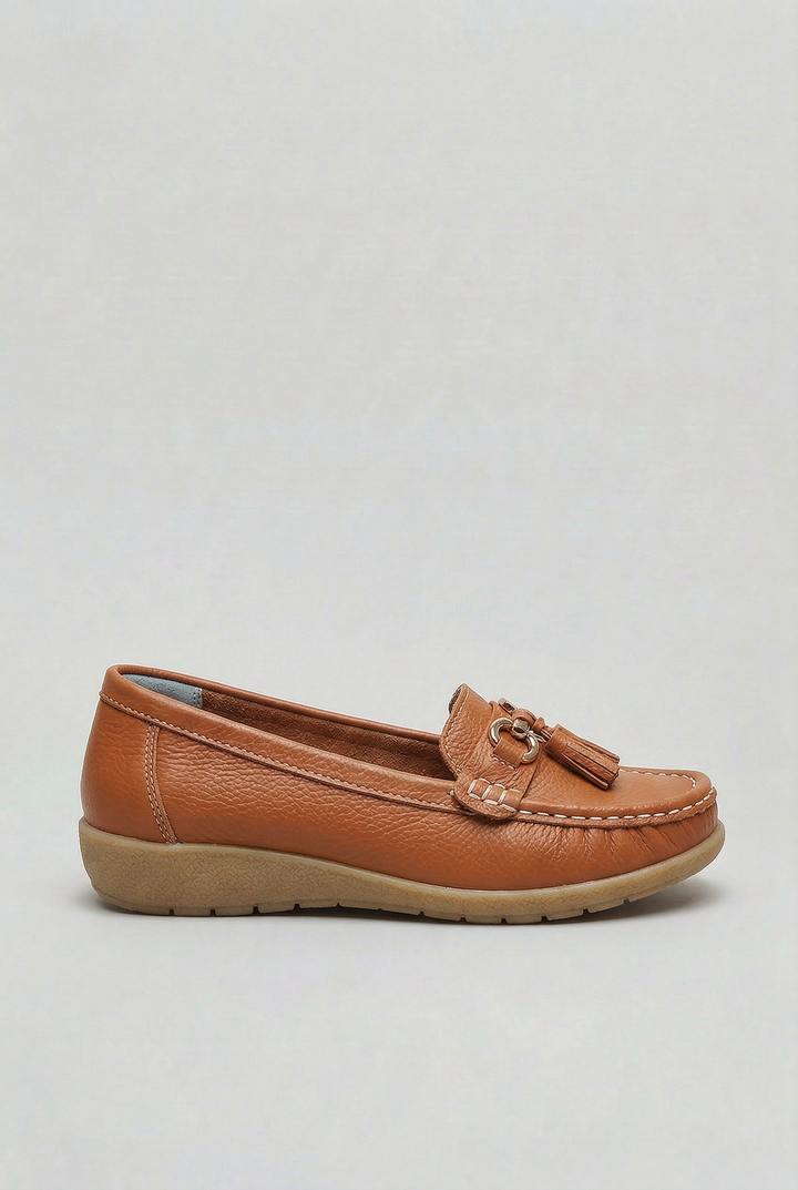 Close-up of the cushioned sole on women's slip-on loafers, emphasizing comfort footwear.