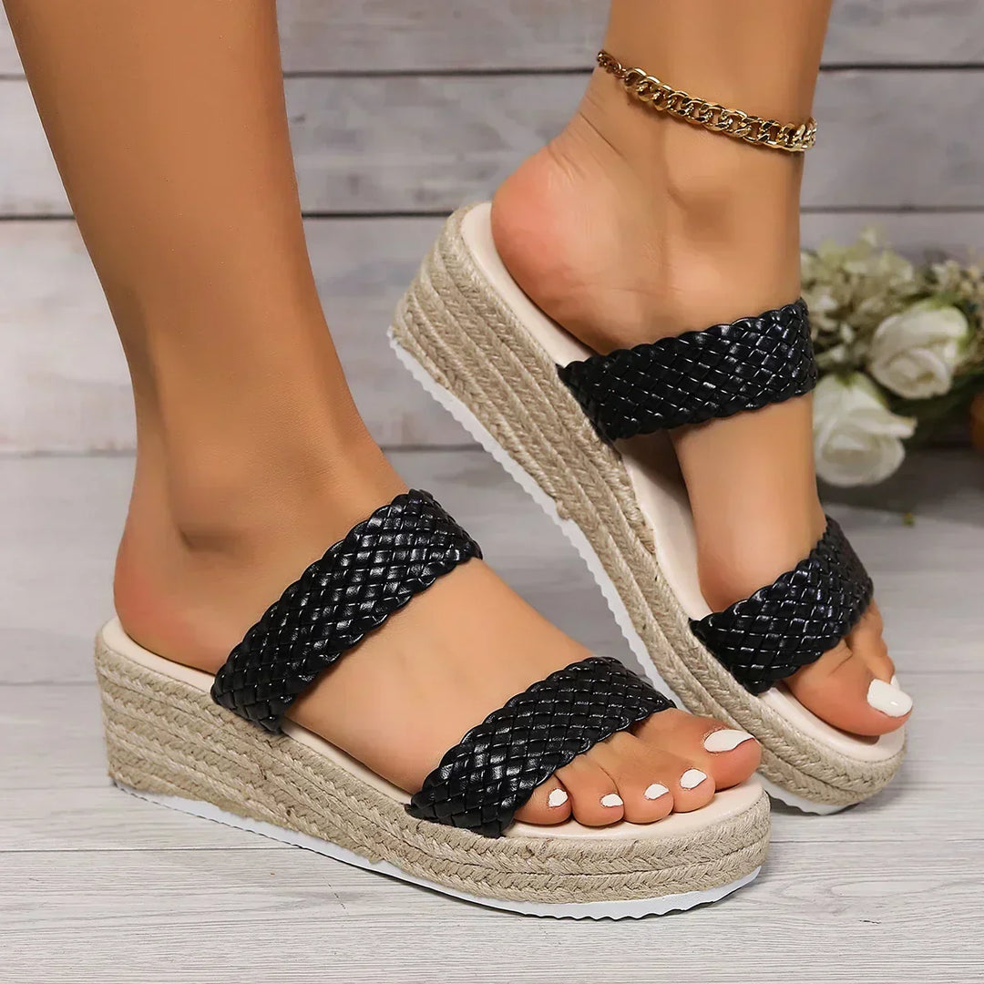 Elegant beige women's wedge sandals with cushioning, ideal for summer casual outfits.
