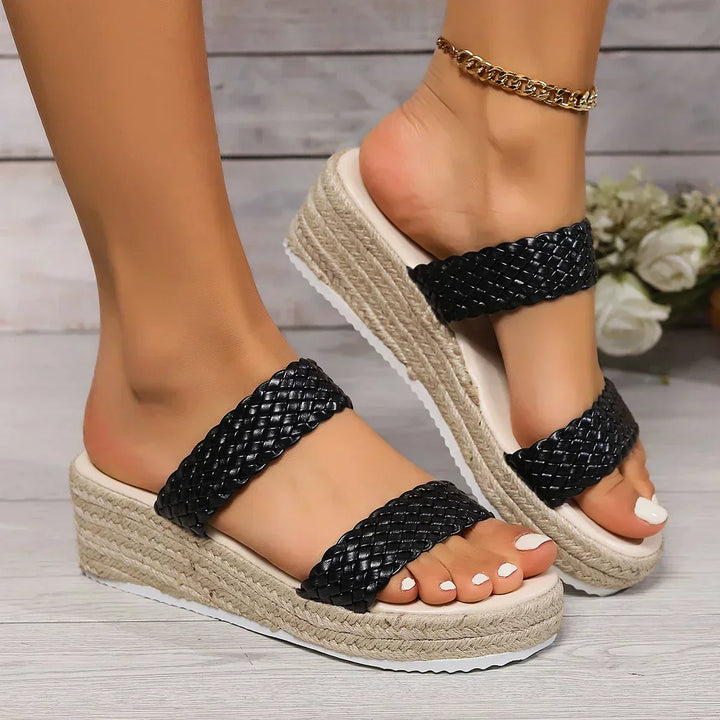 Elegant beige women's wedge sandals with cushioning, ideal for summer casual outfits.