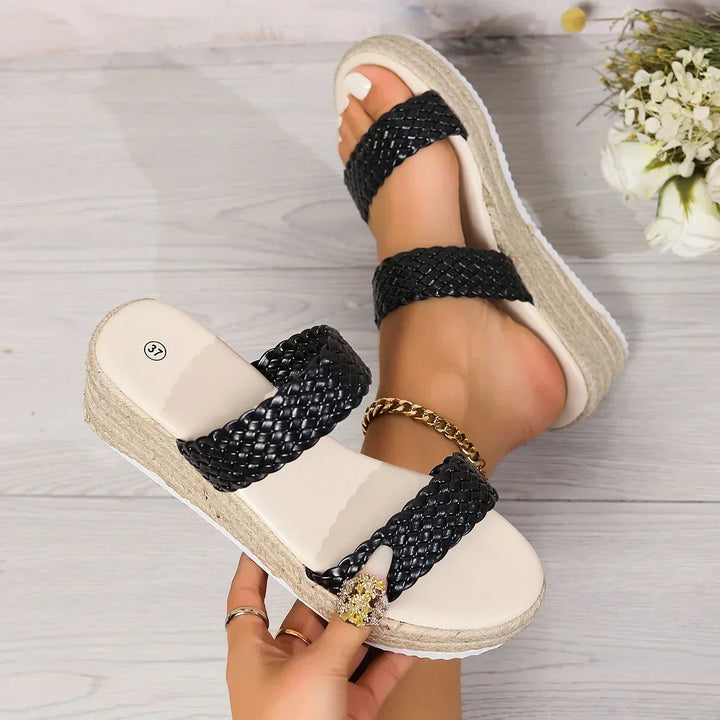 Women's comfortable cushioned wedge sandals, versatile footwear for casual or elegant summer looks.