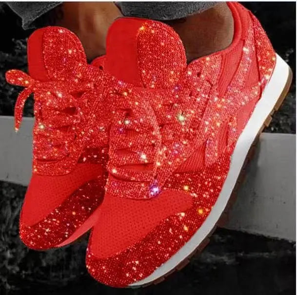 Full view of dazzling women's glitter lace-up sneakers, a sparkling and comfortable choice for fashion.