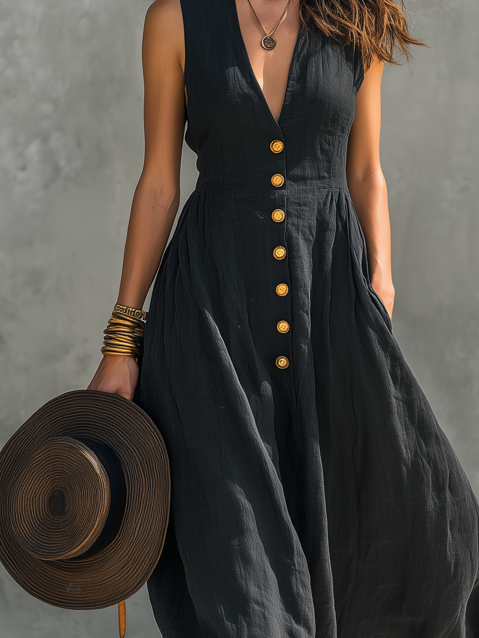 Elegant women's deep V-neck button-front sleeveless maxi dress, perfect for cocktail parties & travel.