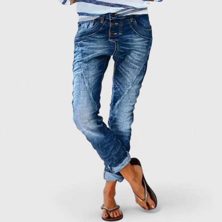 Comfortable women's relaxed fit wide leg jeans. Distressed denim offers a cool, vintage casual look.