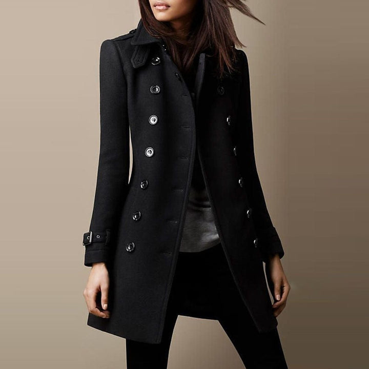 Structured women's long trench coat. Double-breasted tailored design for a professional, elegant silhouette.