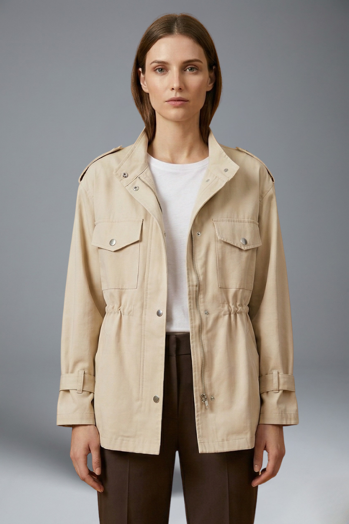 Versatile women's utility jacket, belted with double-breasted front, tailored for modern autumn outerwear.