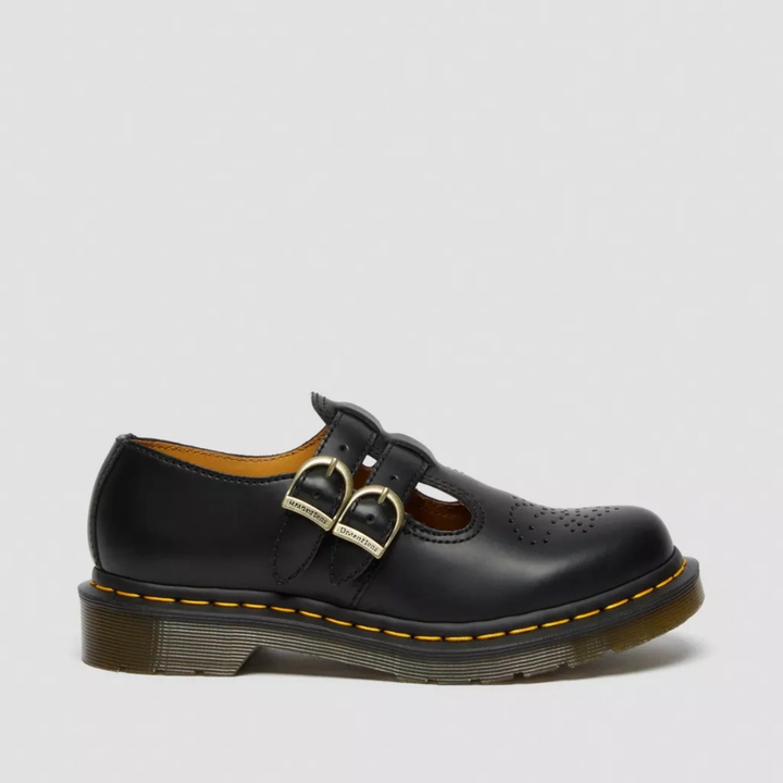 Close-up of black women's double buckle Mary Jane flats, showcasing edgy details and comfort.