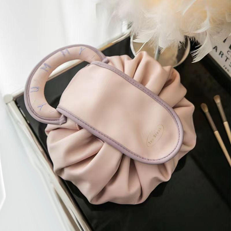 Fashionable faux leather drawstring makeup pouch, a must-have women's accessory