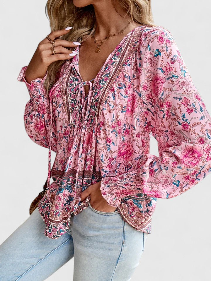 Relaxed fit women's floral long sleeve blouse, featuring a beautiful dreamy floral print.