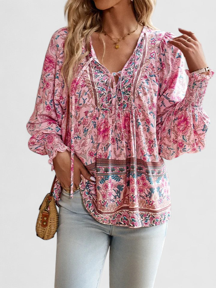 Casual women's dreamy floral long sleeve top, ideal for a relaxed summer style.