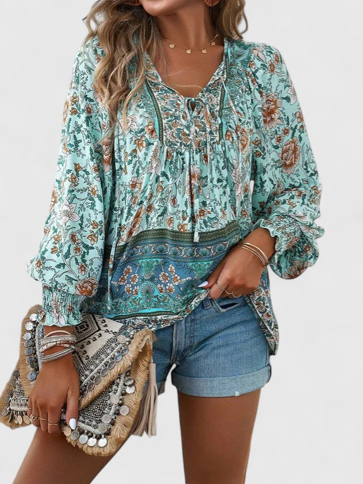 Feminine women's long sleeve floral top in a comfortable, relaxed boho peasant style.