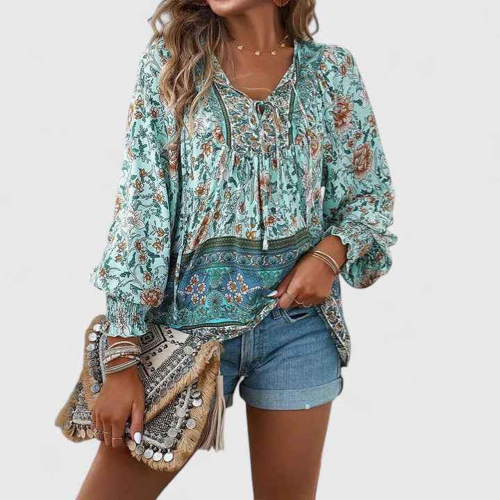 Summer style women's dreamy floral long sleeve peasant top, perfect for casual outings.