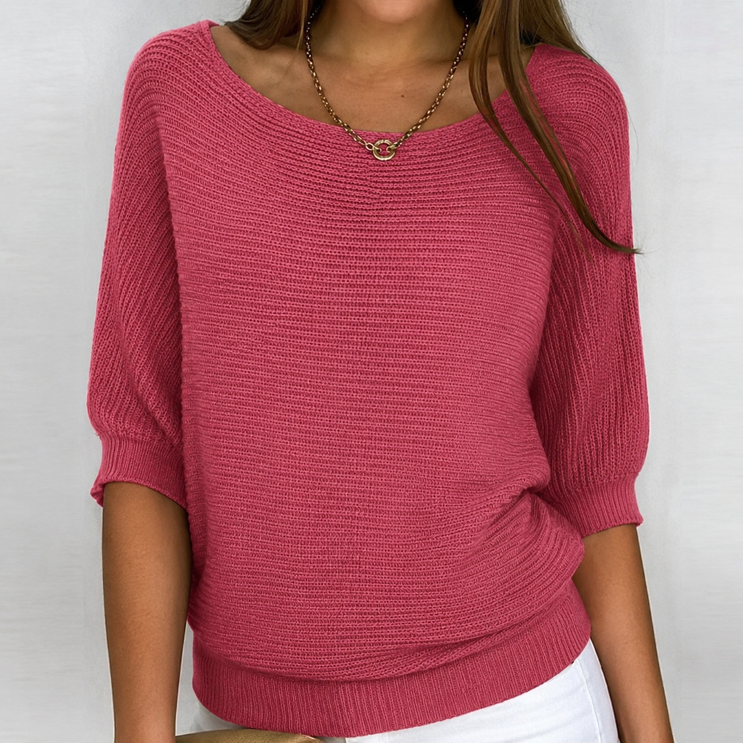 Relaxed women's 3/4 sleeve knit top. Versatile pullover sweater, perfect for fall, winter, or spring outfits.
